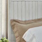 6_8510_Headboard highlighting two toned cap rail and vertical panels_DET